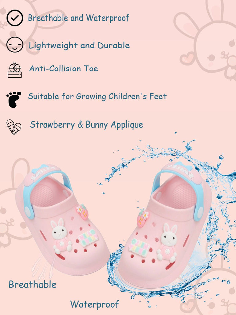 Child-friendly pink clogs with bunny and strawberry appliques for breathable comfort.