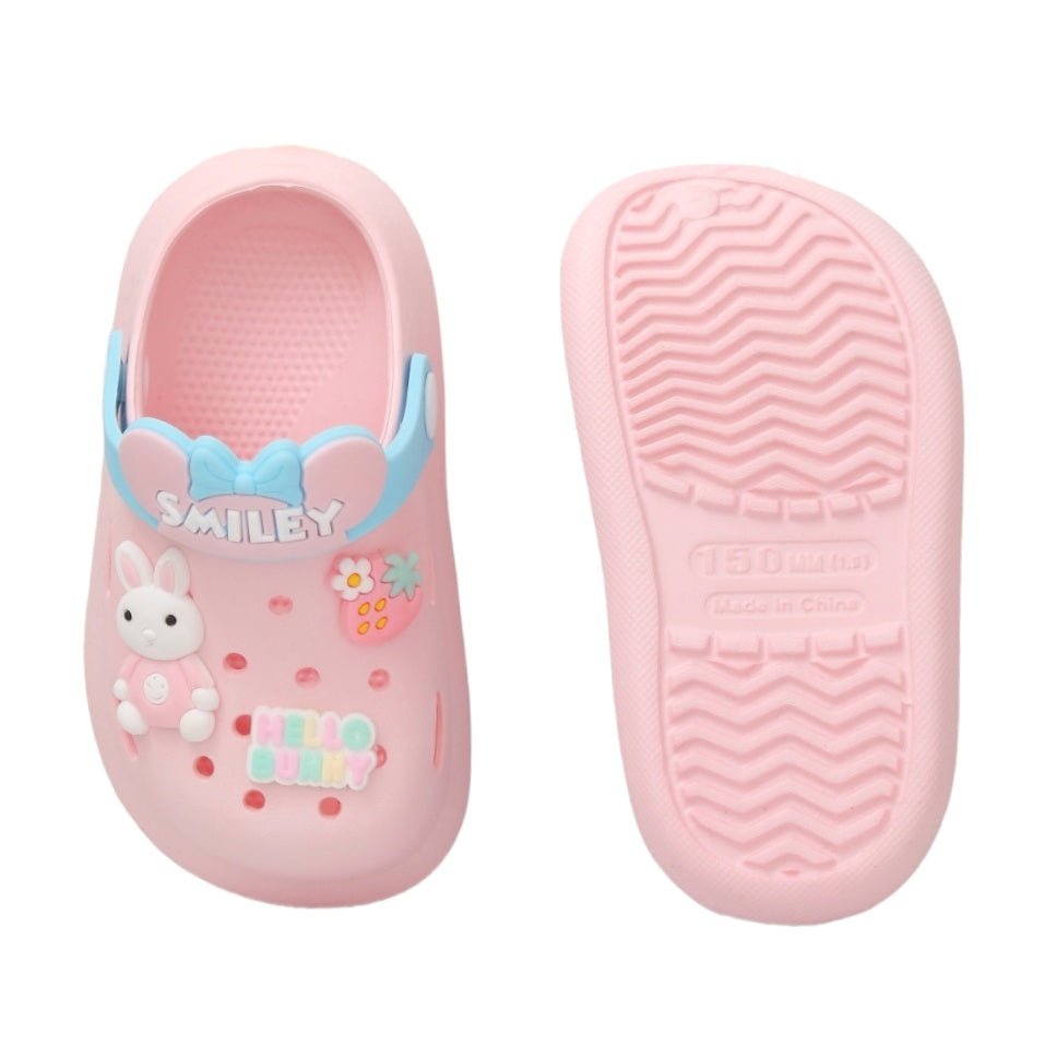 Top and sole view of pink children's clogs with bunny motif detailing