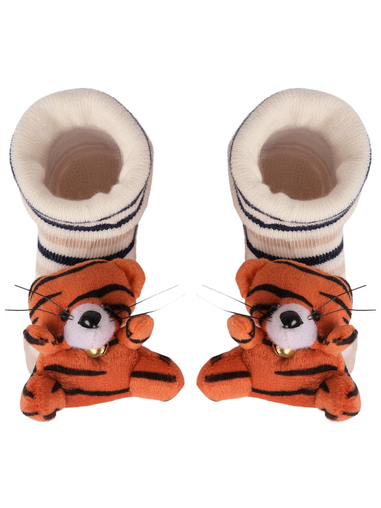 Child's playful tiger stuffed toy socks with a cream-colored cuff and navy stripes - front view.