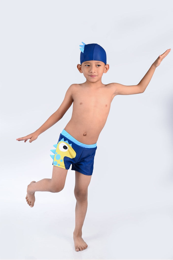 Boy Modeling Yellow Bee Dinosaur Swim Shorts with Matching Swim Cap