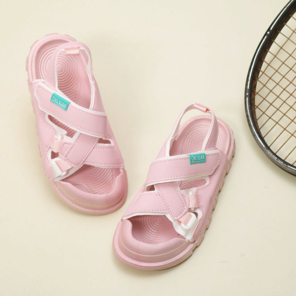 Top view of pink casual sandals with adjustable straps and cushioned insoles for kids.