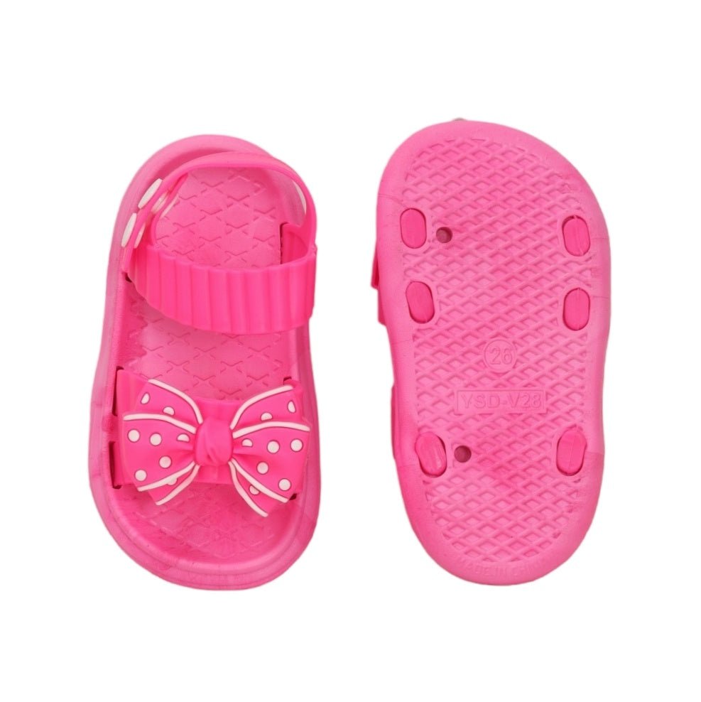 Underside view of the dark pink bow detail sandals, featuring a safe non-slip sole