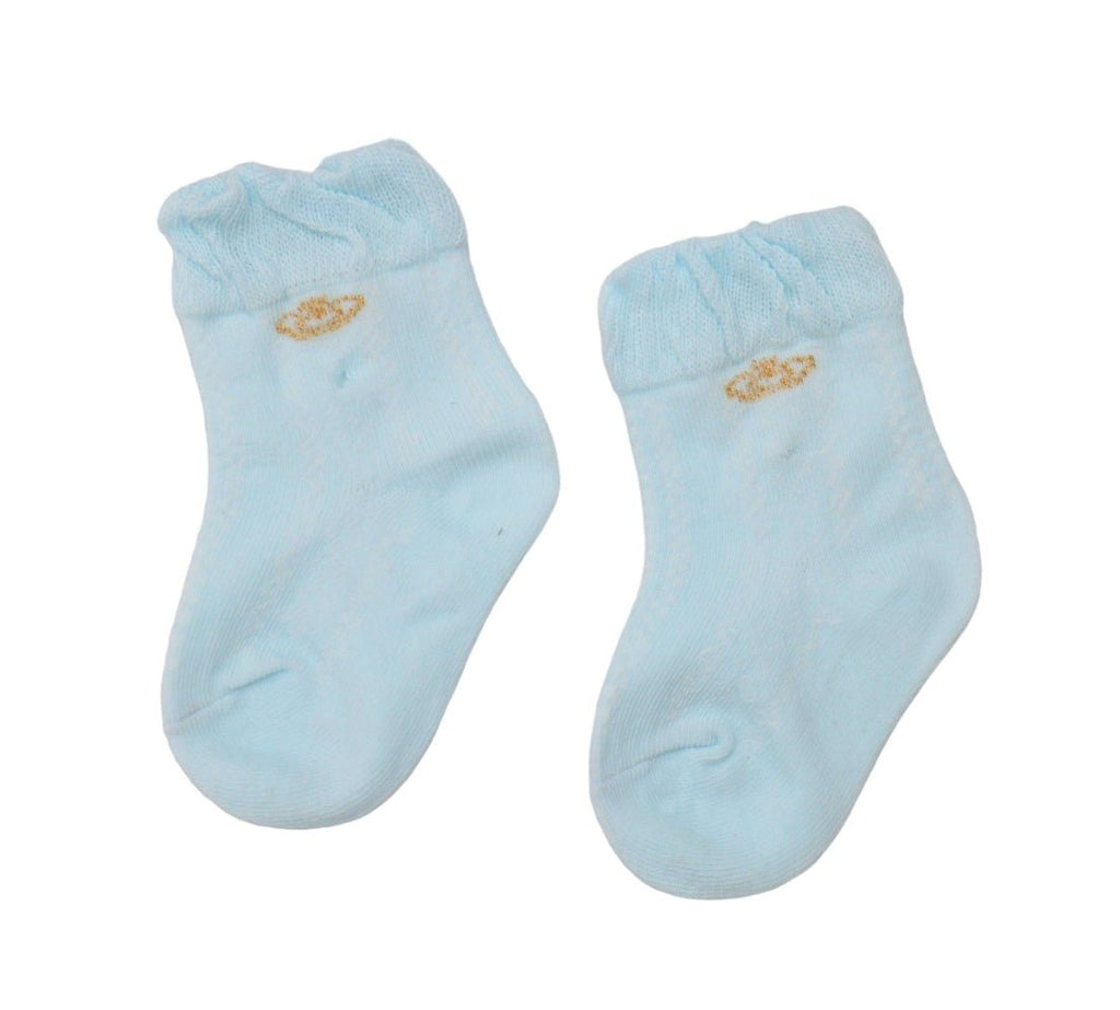 Soft blue infant socks with ruffle cuffs and crown detailing.