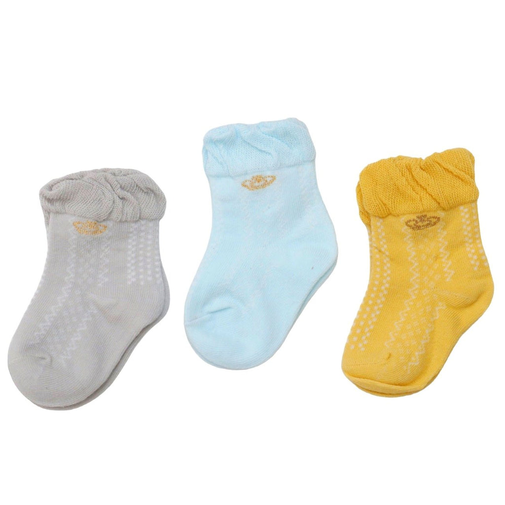 Pastel-colored baby girl socks with crown accents 