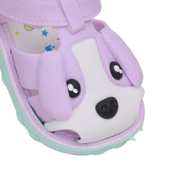 Close-up of the Purple Puppy Applique Sandal's charming puppy face and adjustable purple strap.
