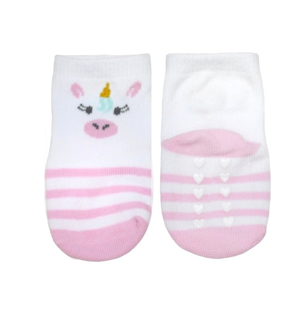 Close-up of girl's pink-striped unicorn socks with heart details.