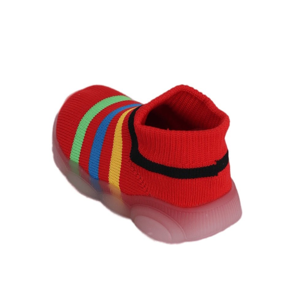 Brightly striped soft shoe socks for toddlers, perfect for indoor and outdoor play