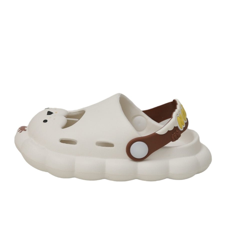 Profile View of White Lion Kids' Clog with Yellow Strap and Smiling Lion Design