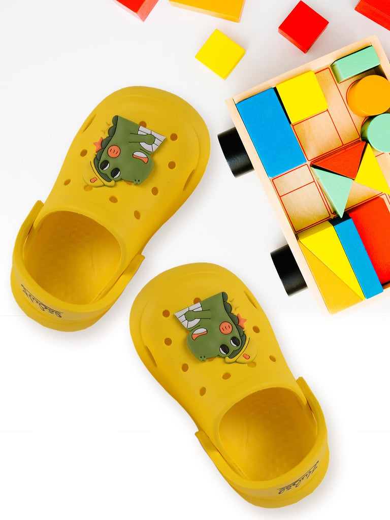 Durable and fun Boys' Yellow Clogs with Dino Motif on top