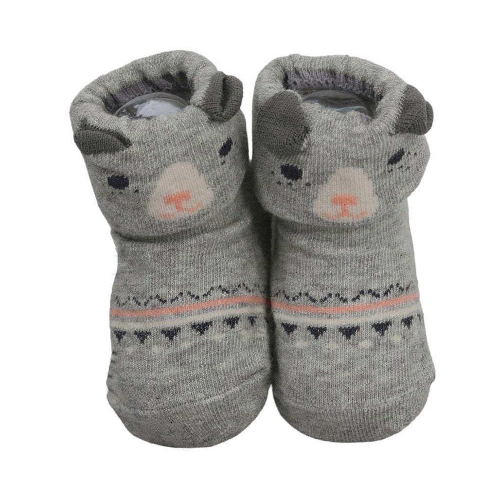 Grey baby socks with anti-skid soles and cute cat face design.