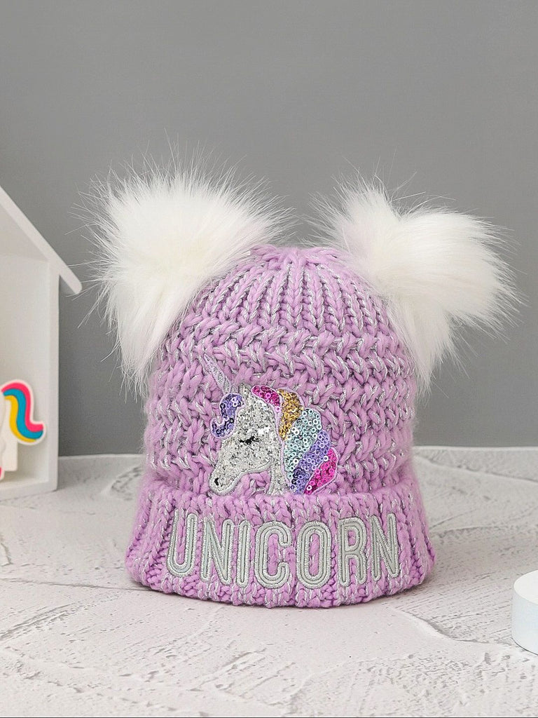 Lavender hat with dual pom-poms and a sparkling unicorn and "UNICORN" text, capturing a whimsical style.