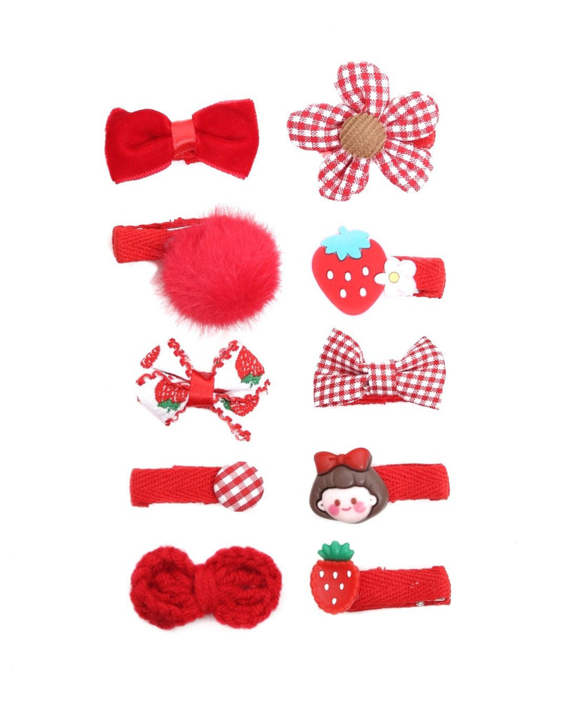 Yellow Bee's set of 10 red embellished hair clips for girls laid out on a white surface.