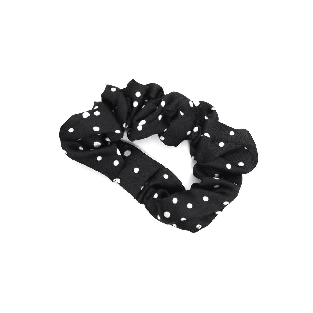 Playful black polka dot scrunchie for girls, part of Yellow Bee's hair accessory set.