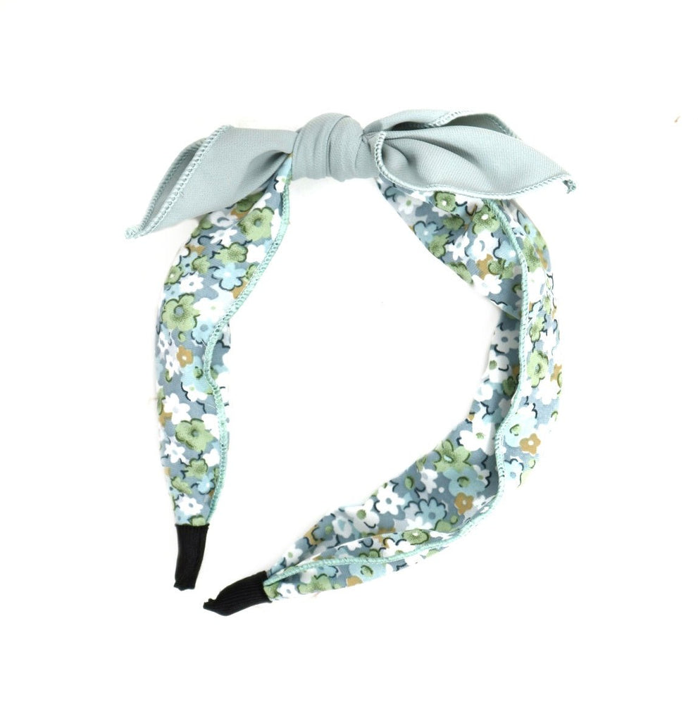Mix of Yellow Bee's blue cotton hair bands with floral print and solid color, ideal for versatile styling options.