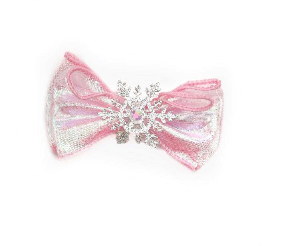 Pink snowflake bow hair clip for girls, perfect for festive occasions