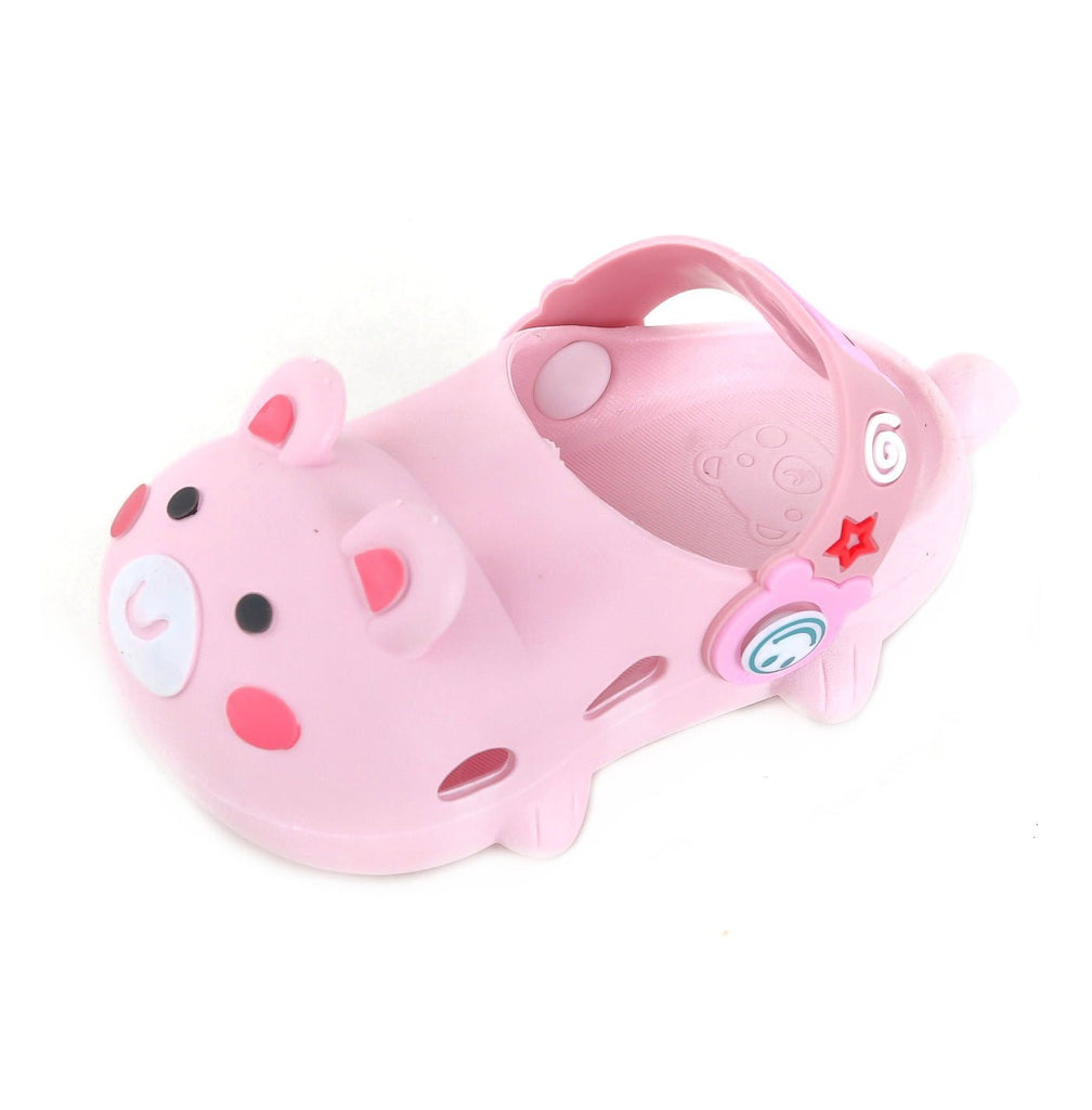 Side view of pink children's clogs with a cute bear face, ready for fun and comfort