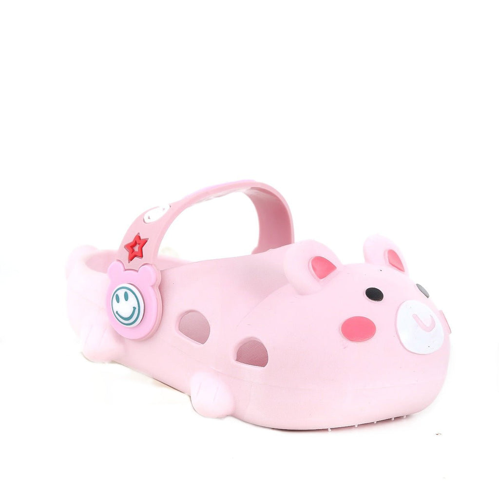 Kids' pink bear clogs from a playful angle, highlighting the snug-fitting heel strap