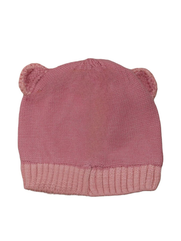 Dark pink solid knitted beanie with teddy ears for girls laid flat.