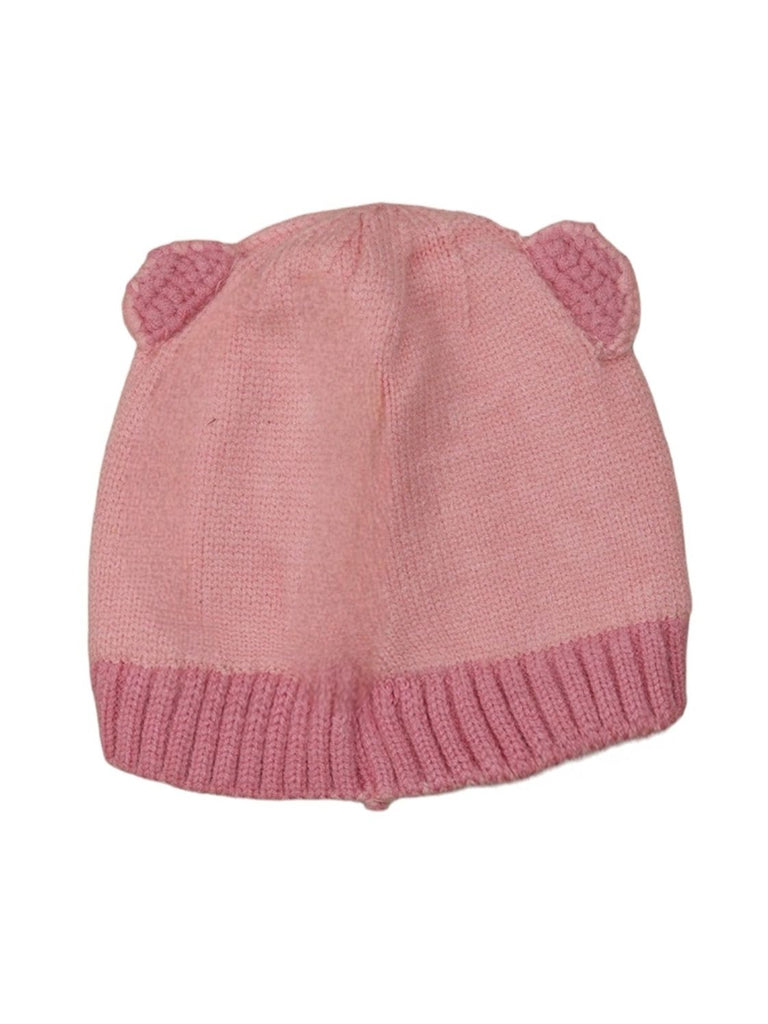 Detailed view of light pink knitted beanie with cute teddy ears for baby girls.