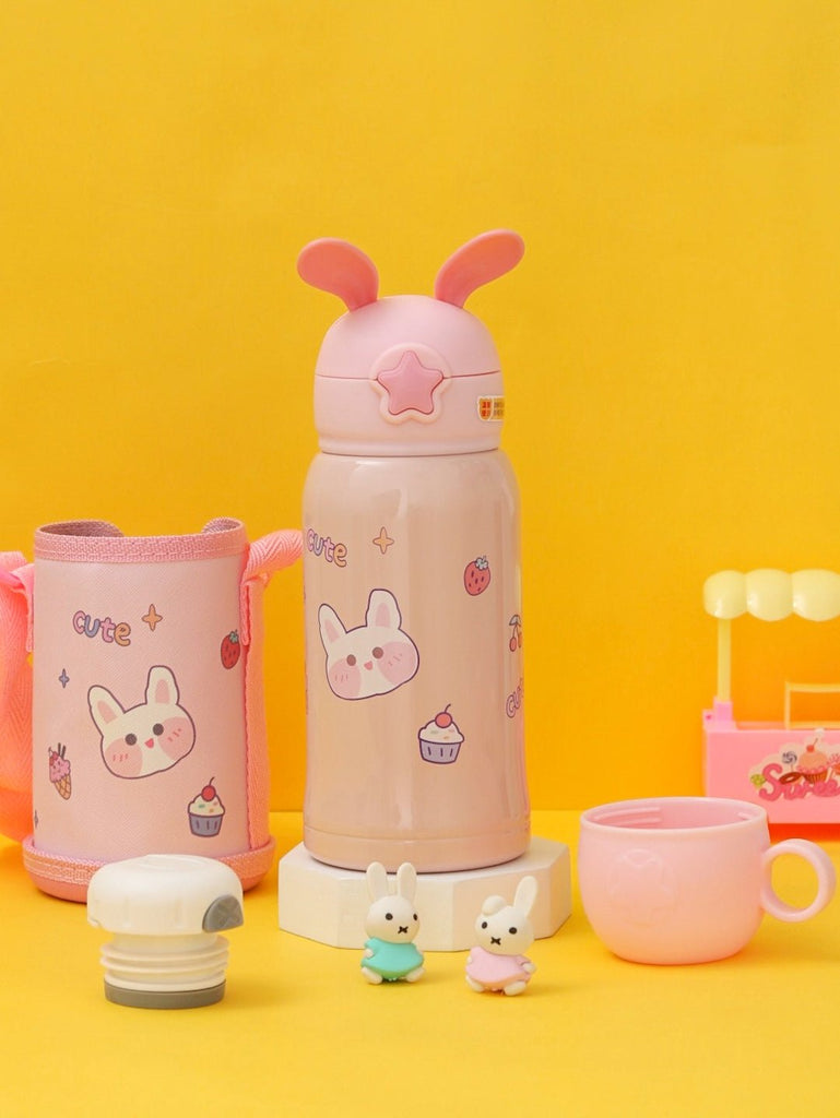 Complete view of Yellow Bee's Stainless Steel Bunny Flask in beige with a pink bottle cover and cute accessories