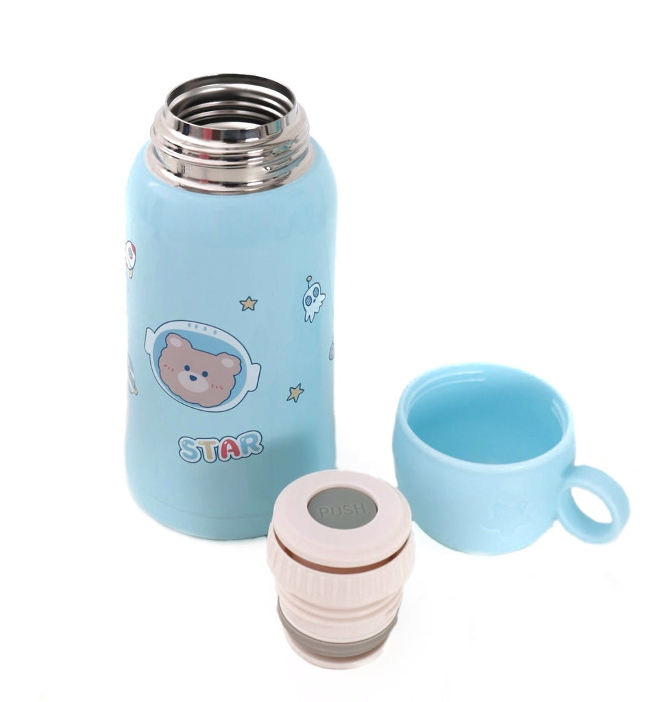 Disassembled Yellow Bee blue water bottle with bear design, cup, and cap
