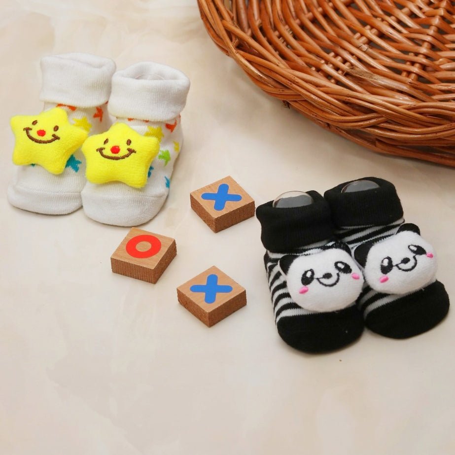 Baby boy's socks set featuring happy stars and pandas with tic-tac-toe game blocks.