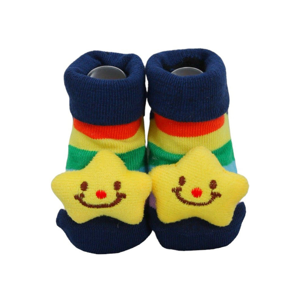 Front view of blue and multi-color striped baby boy socks with smiling star characters