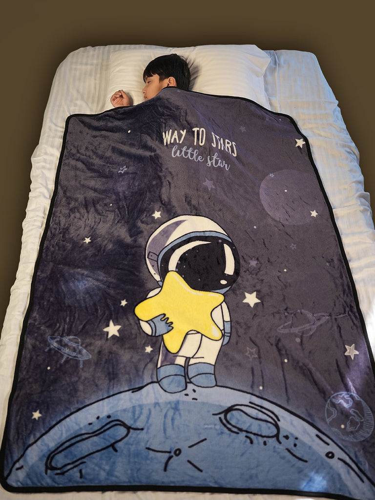 "Boy in Slumber with Astronaut Blanket - Embrace of the Cosmos
