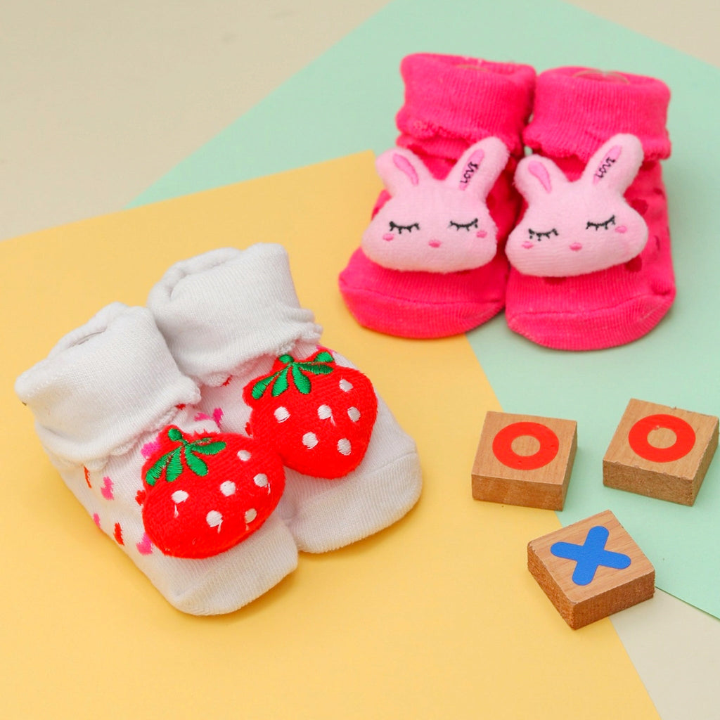 Baby Girl's Pink Bunny and White Strawberry Socks Set on Colorful Background