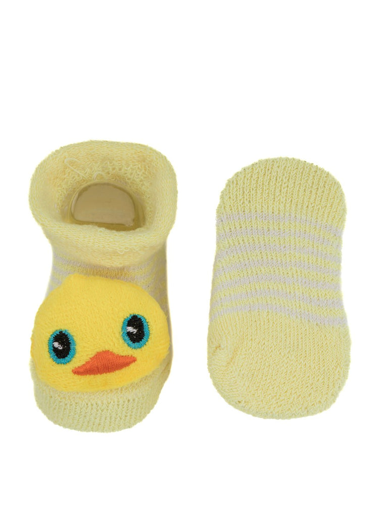 Bottom view of toddler socks with duck and strawberry toys and a non-slip outsole