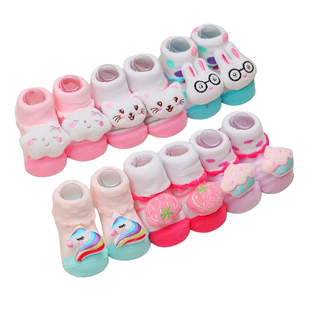 Full set of whimsical infant socks with stuffed animal motifs