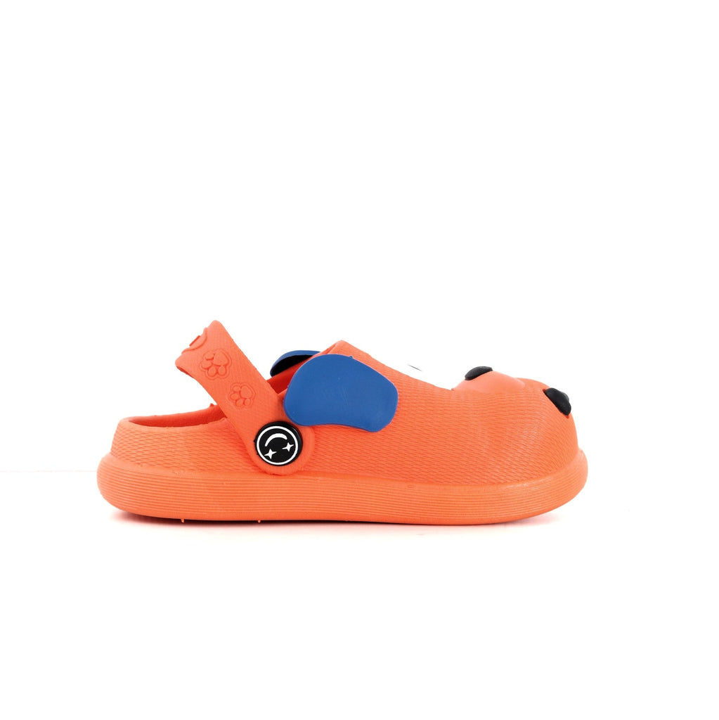 Boy's orange clogs with puppy design and secure heel strap for active play.