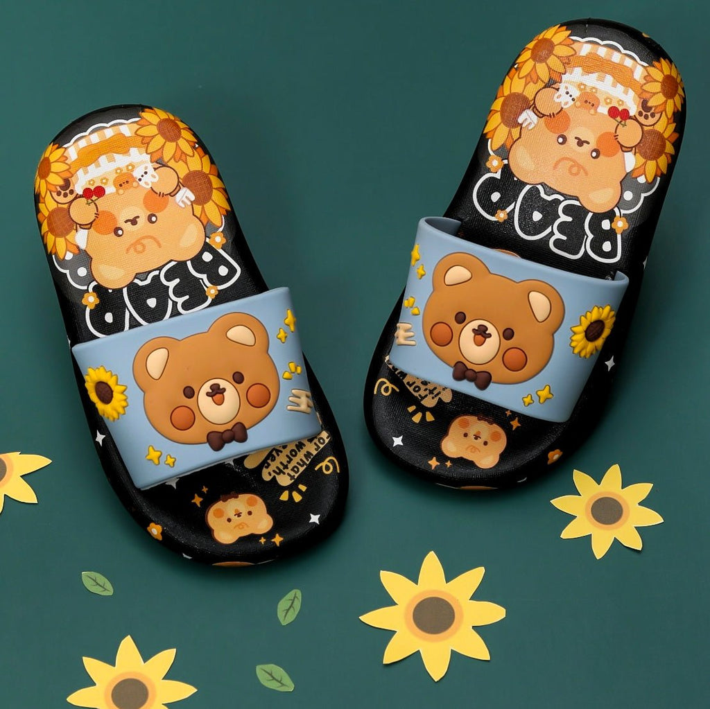 Midnight black teddy applique slides with vibrant sunflower accents, perfect for adding a cozy touch to your style