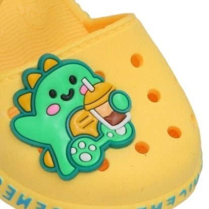 Close-up of the Cute Green Dinosaur Detail on a Sunny Yellow Kid's Sandal