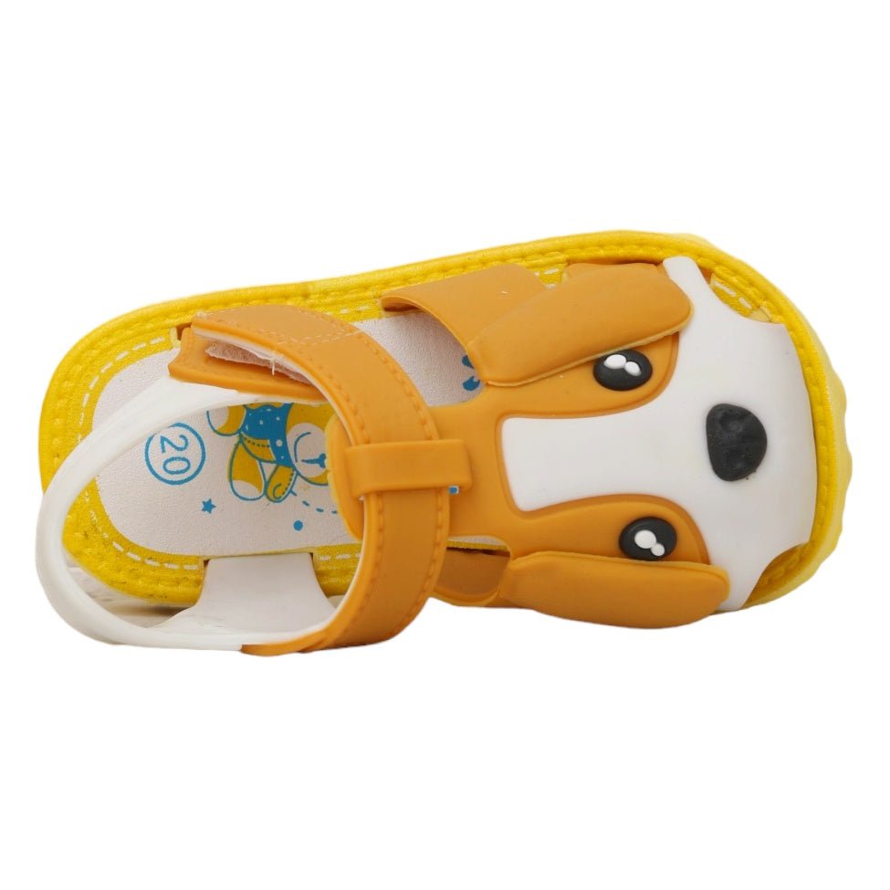 Brown puppy-themed children's sandals in a side view, illustrating the secure and child-friendly closure.