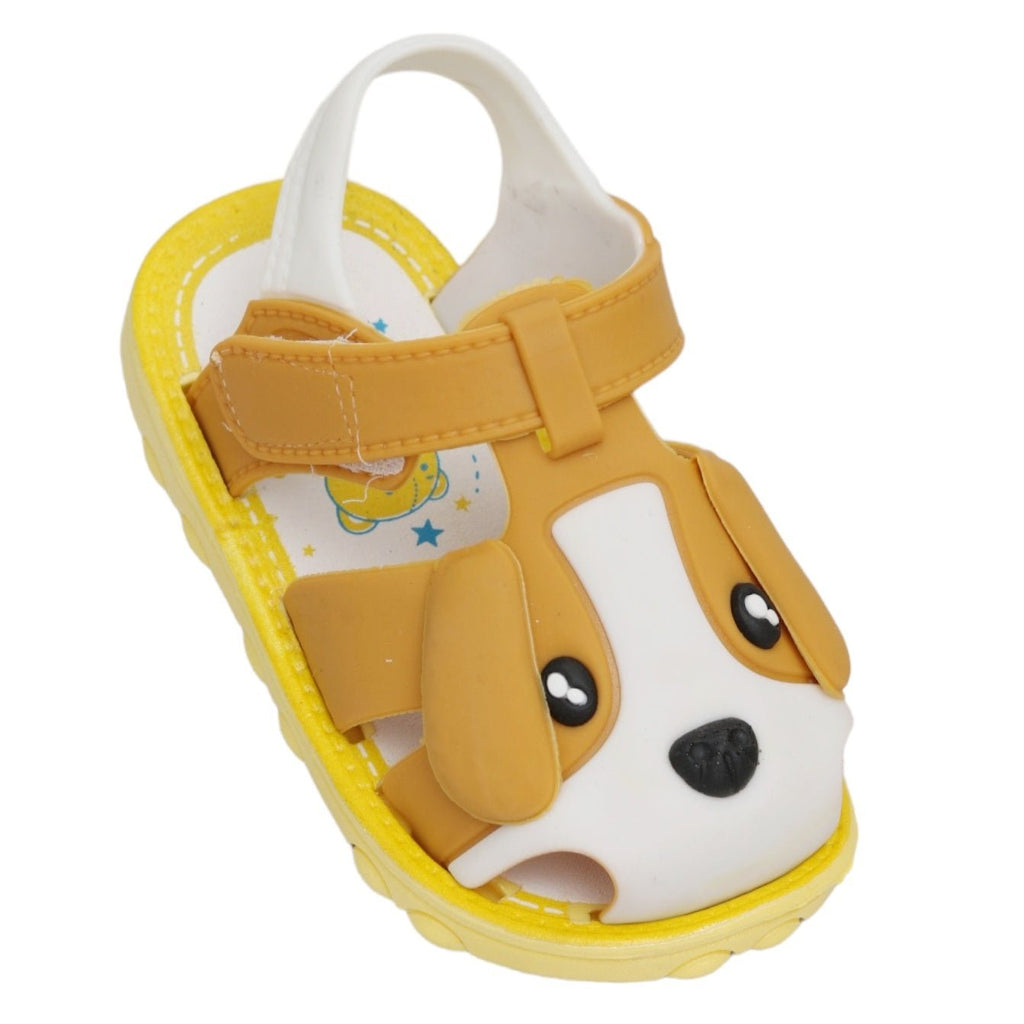 Profile view of brown puppy applique sandals for children, featuring adjustable strap and cushioned insole.