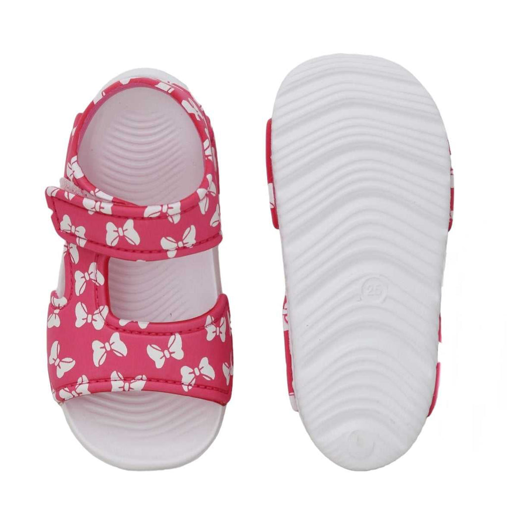 Top and bottom view of cute pink sandals with bow print for kids