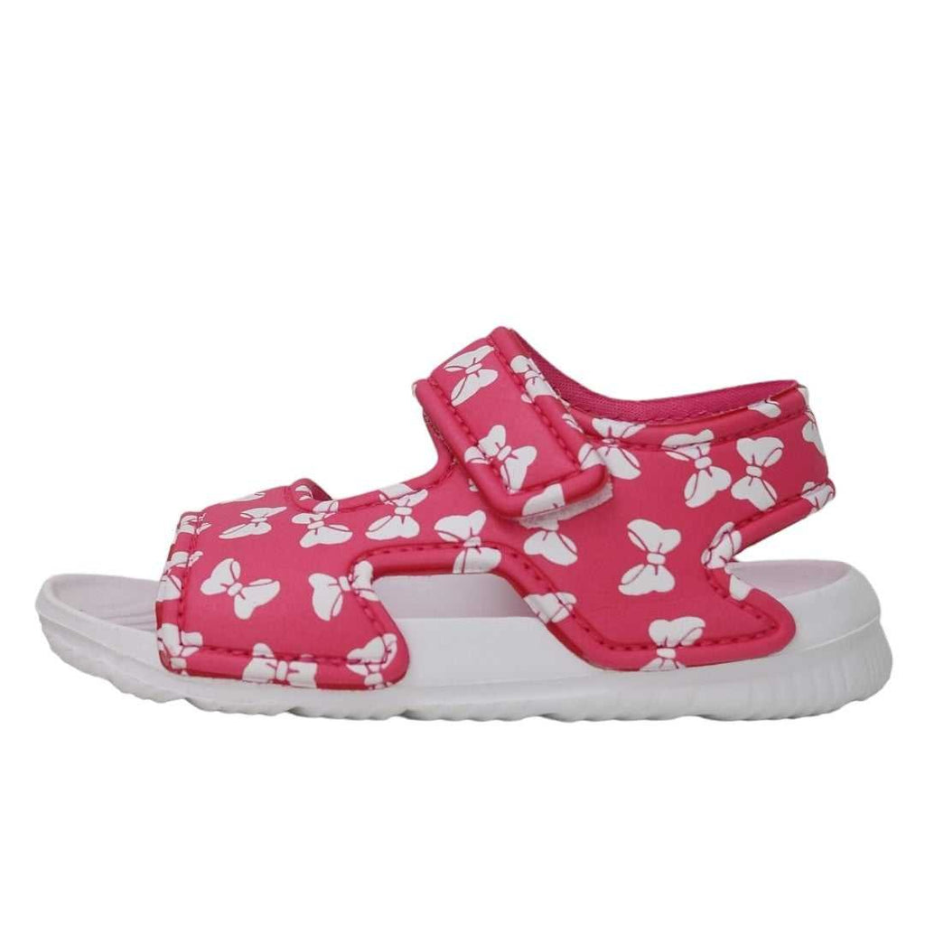 Side view of pink and white bow print children's sandal