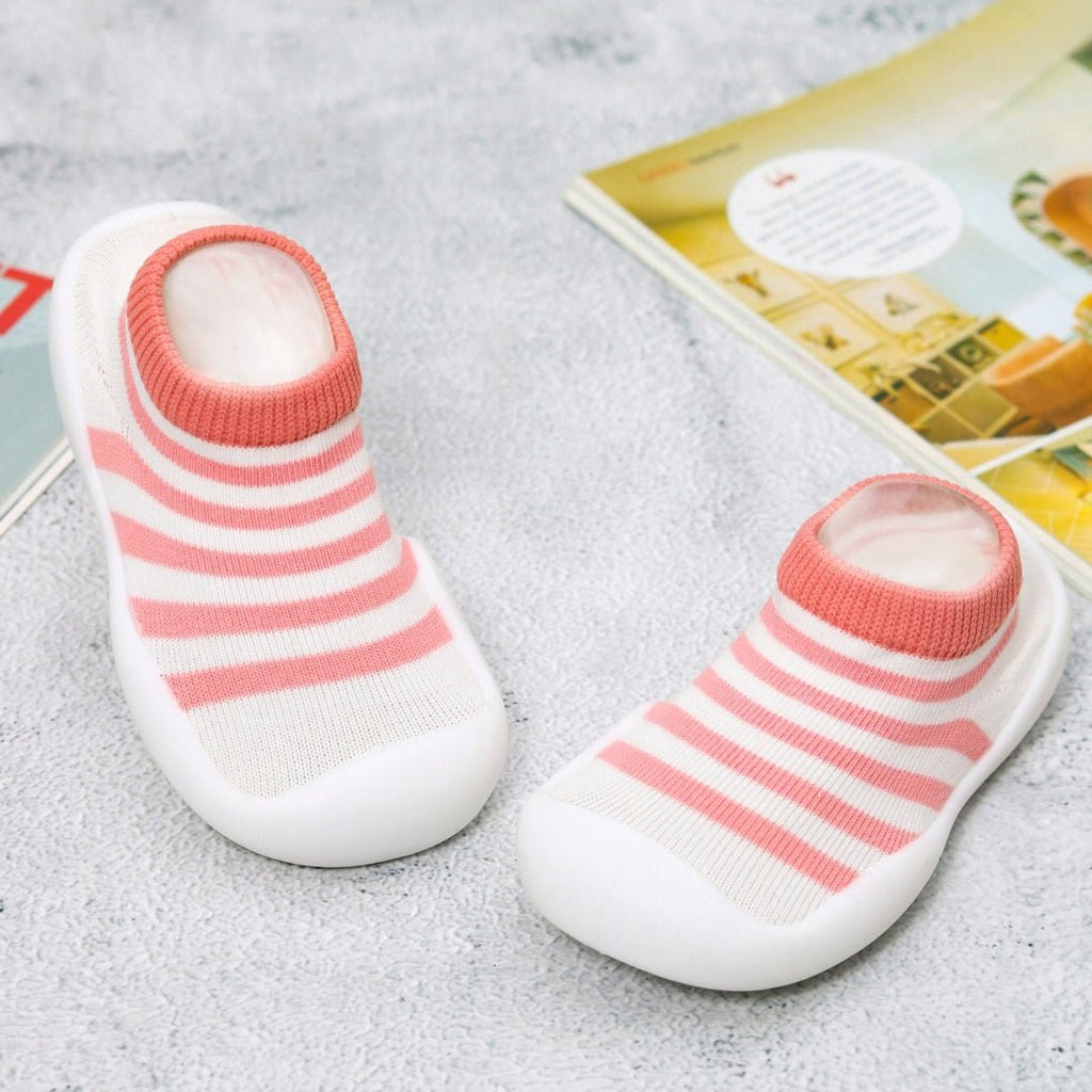 Pair of Yellow Bee pink and white striped sock shoes for playful toddlers