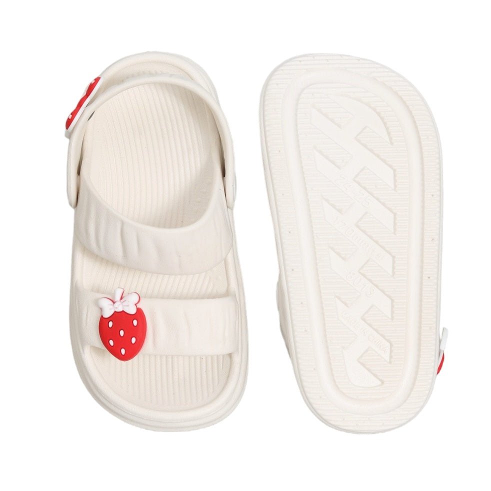 Top and bottom view of the white strawberry and bow sandals, emphasizing the secure design.