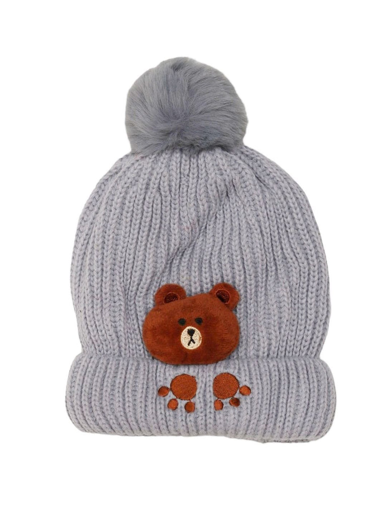 Front view of a boy's grey knit hat with teddy bear design and pom-pom.