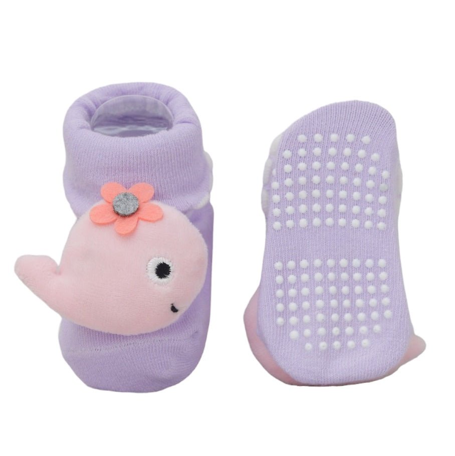 Bottom view of baby girl's white bee socks with anti-slip dots