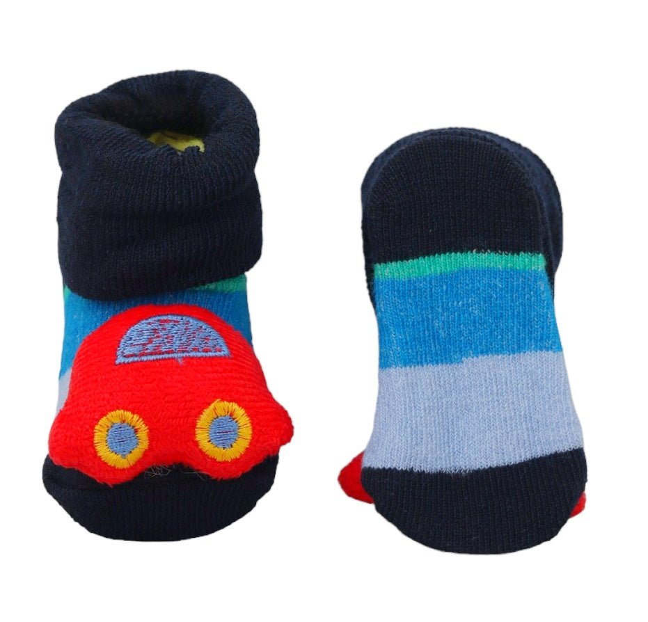 Colorful baby boy socks with car patterns, side and sole view showing anti-slip details