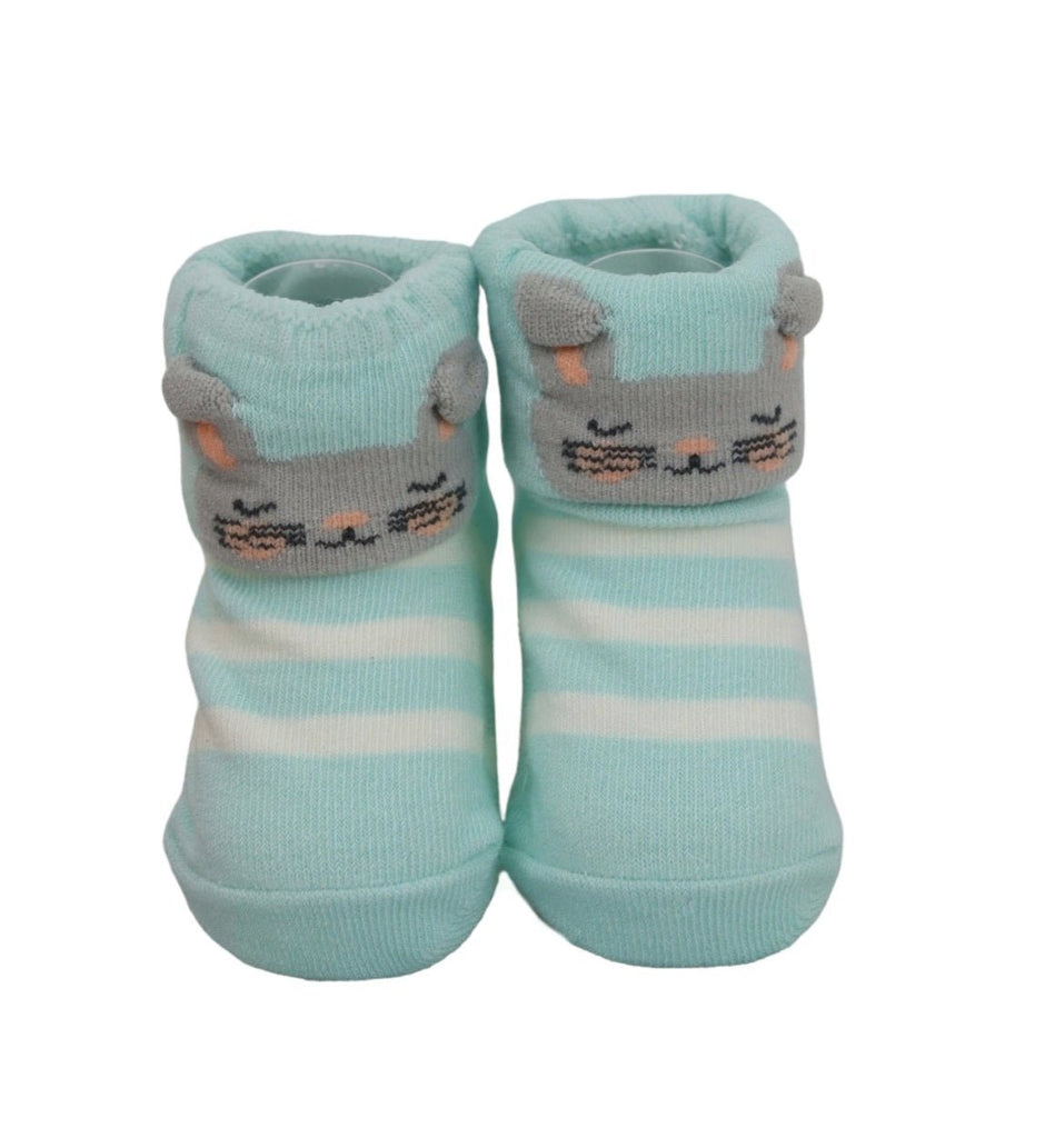 Grey duckling design on anti-skid socks for baby girls.