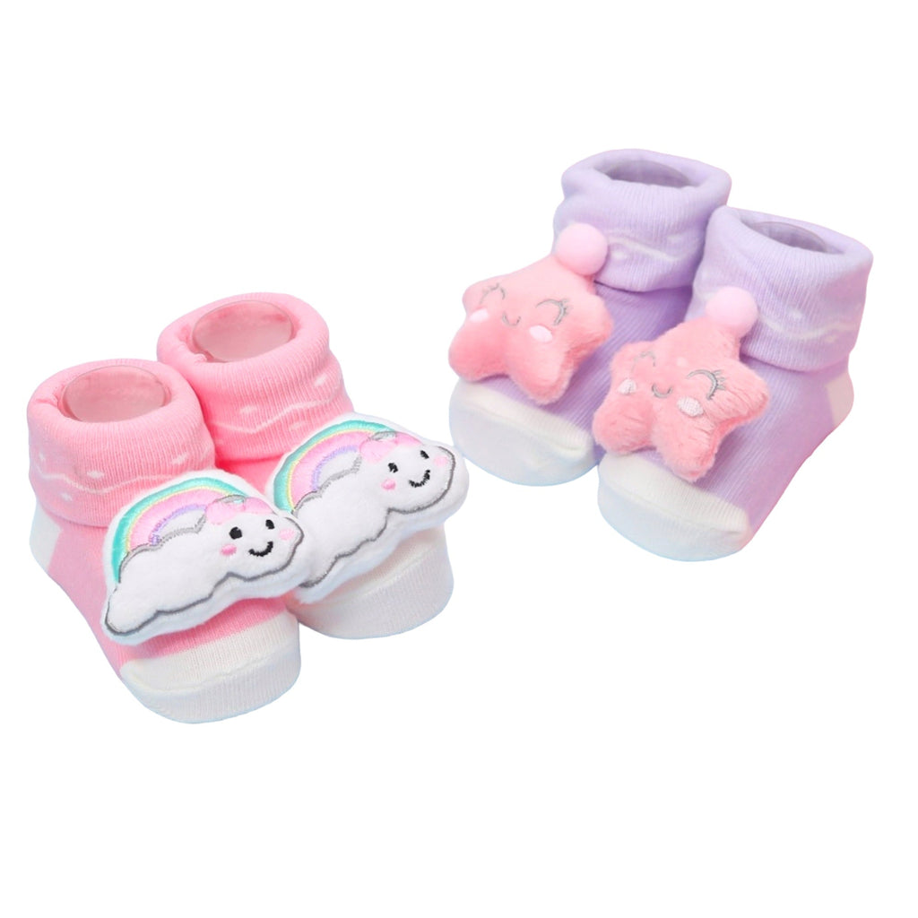Set of rainbow cloud and pink star baby girl socks on blue and pink background