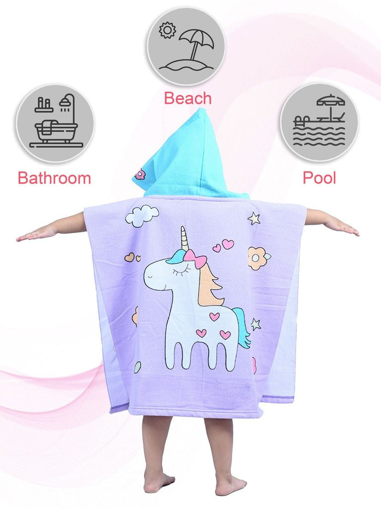 Cheerful Girl in Unicorn Poncho Towel - Back View