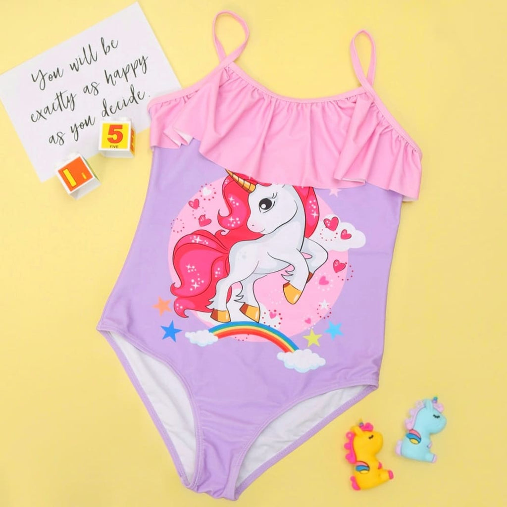 Girls' Unicorn Swimsuit by Yellow Bee Laid Out