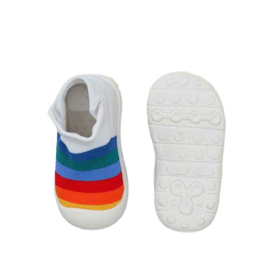 Top and bottom view of Yellow Bee's rainbow striped shoe socks, showcasing the flexible design