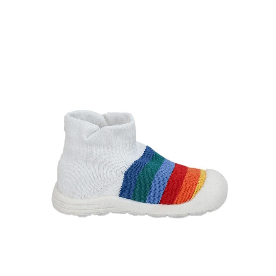 Side angle of Yellow Bee's rainbow striped shoe socks against a white backdrop