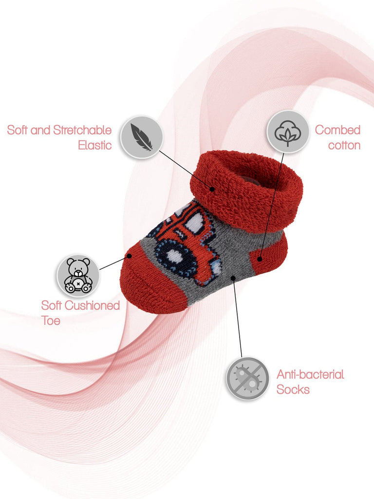 Red kids’ sock highlighting soft stretchable elastic, combed cotton, and a cushioned toe.
